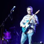 student performing at Supertonic Guitar concert